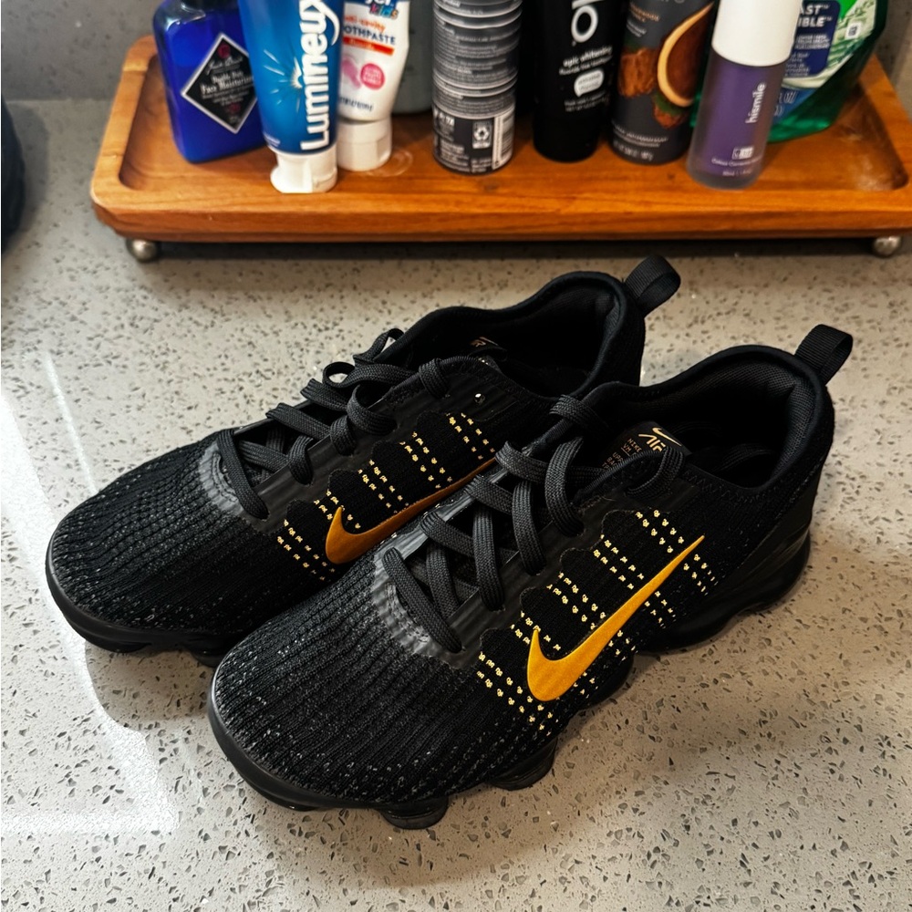 Nike Black and Gold Athletic Vapormax